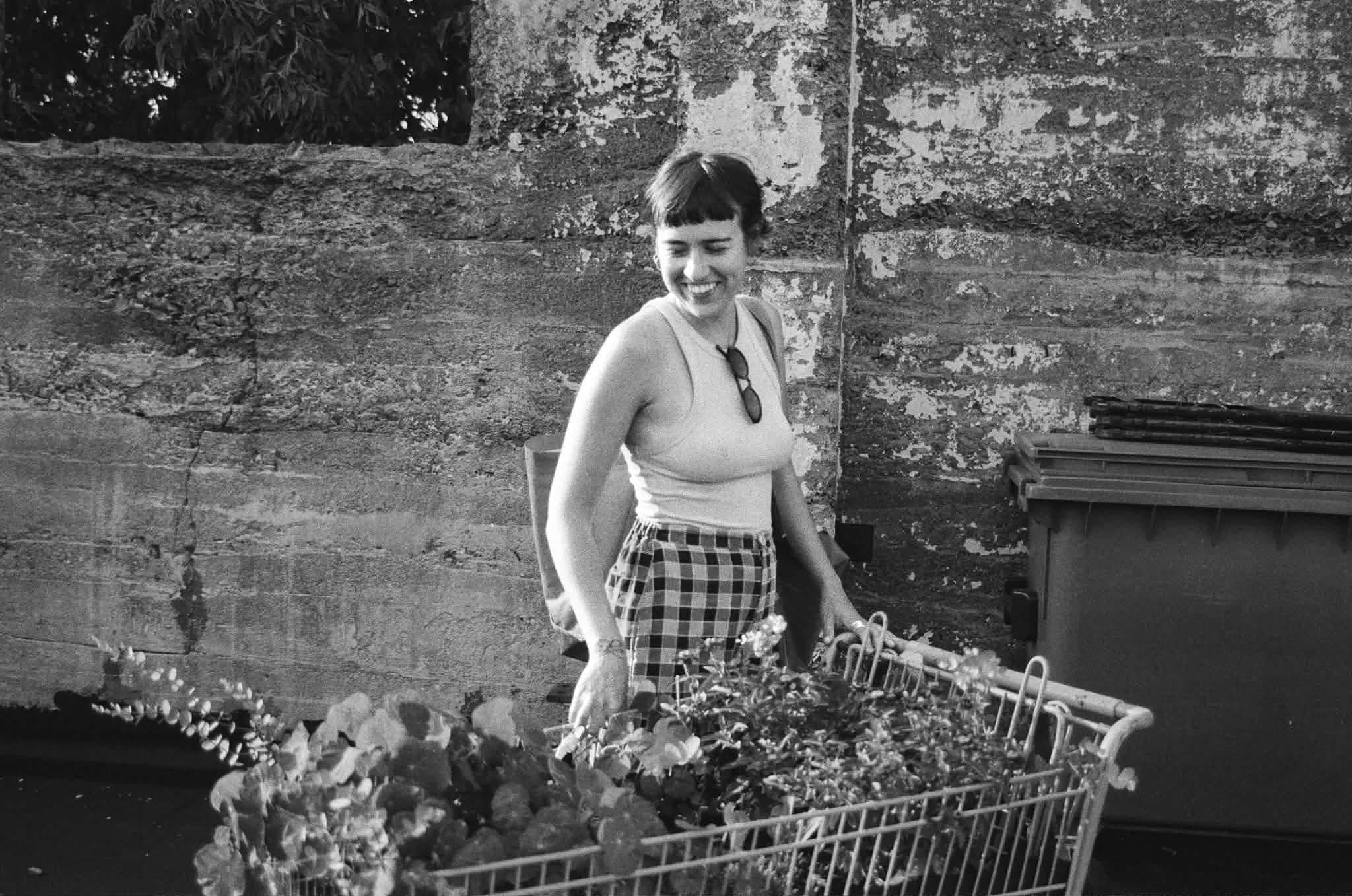 Emily Gray with flower cart